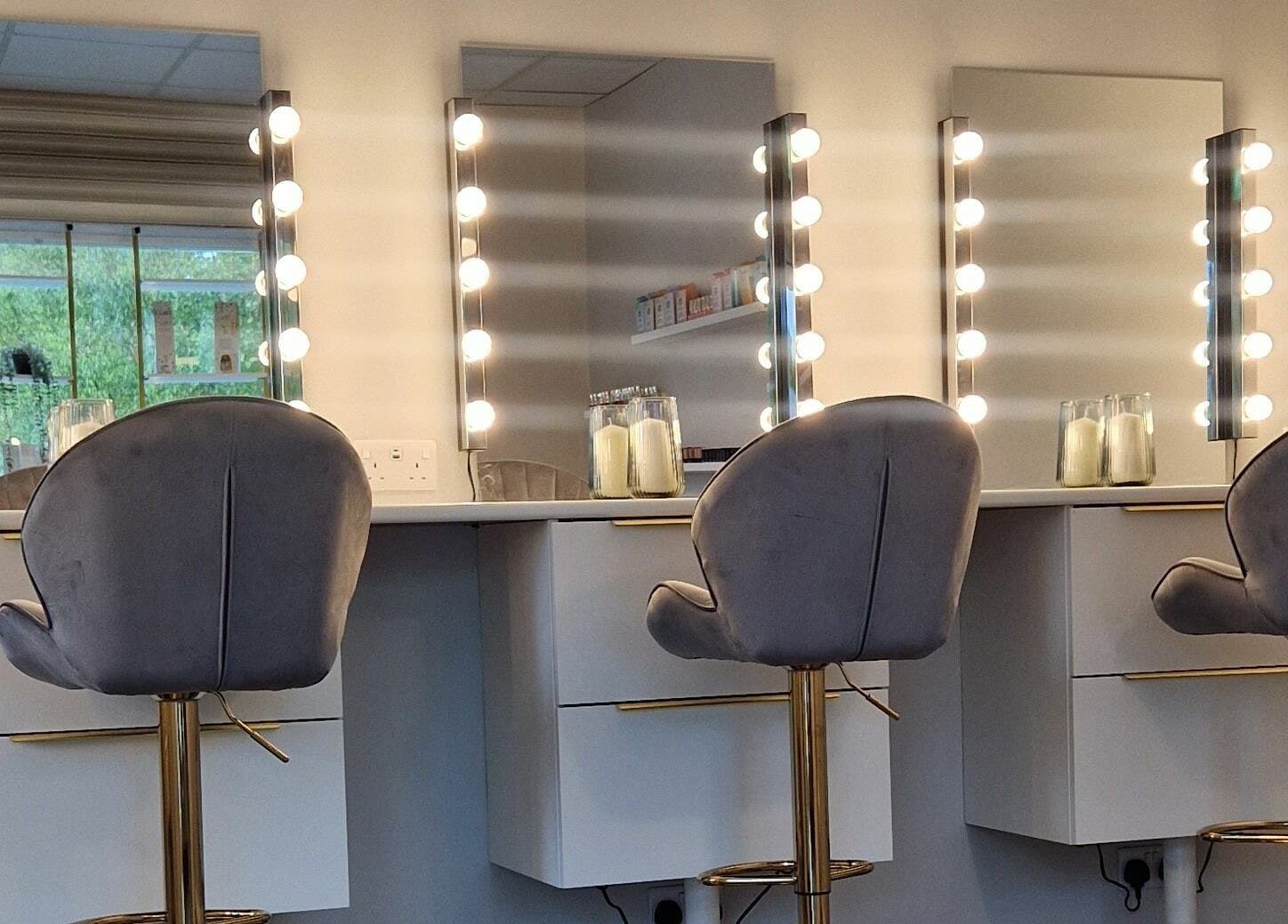 Luxurious makeup station at Radiant Beauty Glasson, Athlone, County Westmeath, IE, featuring elegant vanity mirrors.