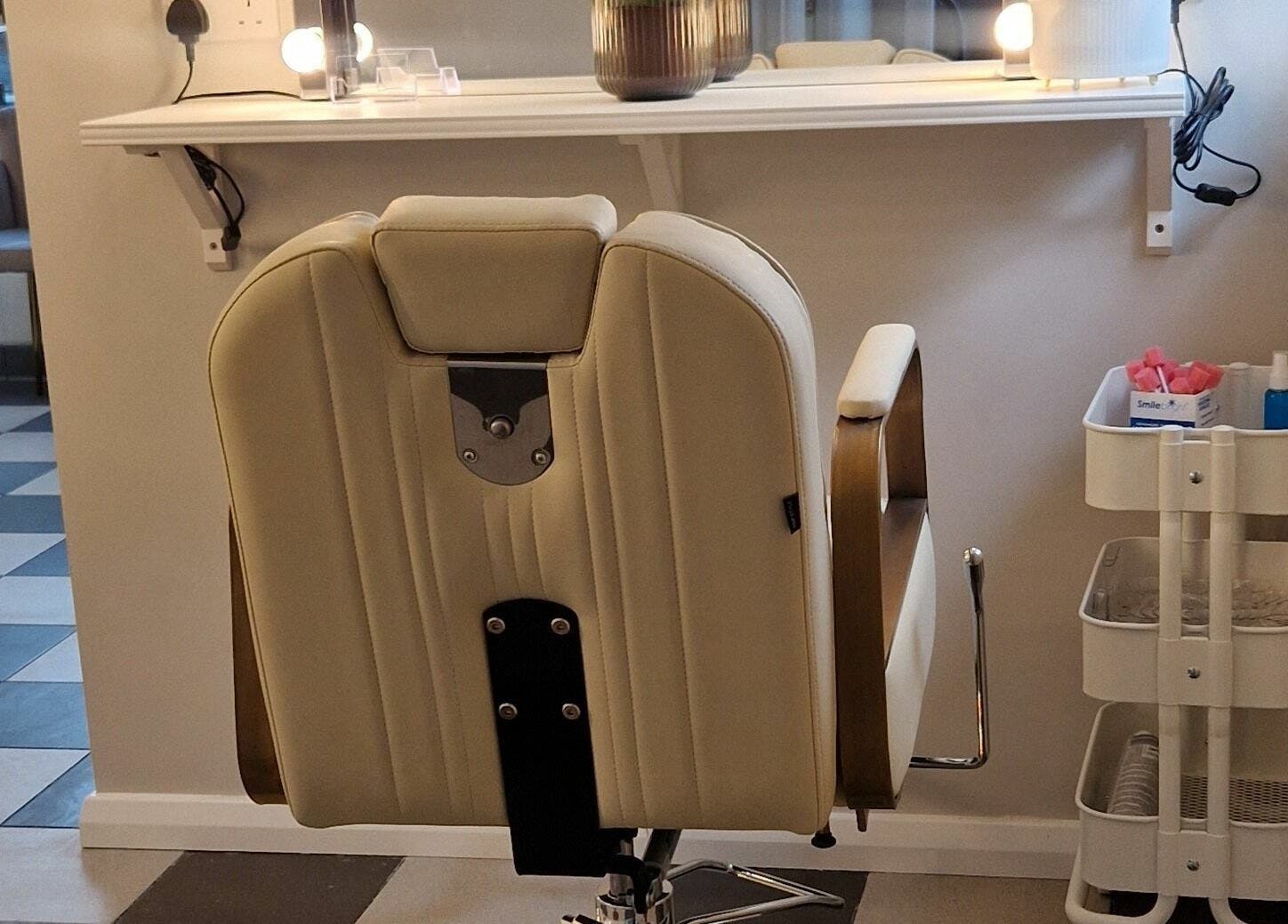 Modern salon chair at Radiant Beauty Glasson, Athlone, County Westmeath, IE with sleek decor and lighting.