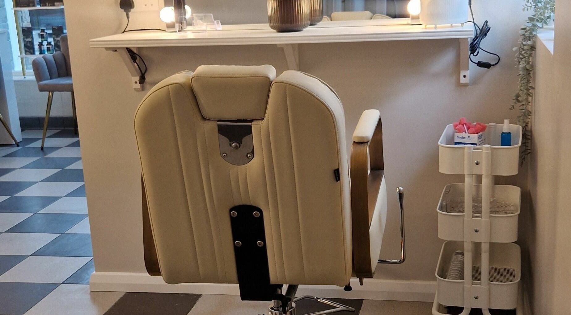 Modern salon chair at Radiant Beauty Glasson, Athlone, County Westmeath, IE with sleek decor and lighting.