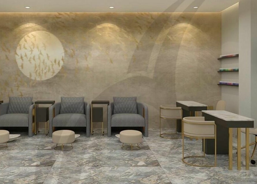 Modern salon interior at The Beauty House by Takhmina Usmani, Dubai, AE featuring stylish chairs and tables.