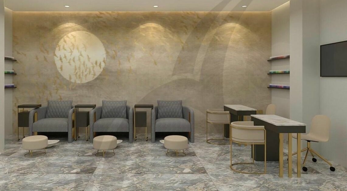 Modern salon interior at The Beauty House by Takhmina Usmani, Dubai, AE featuring stylish chairs and tables.