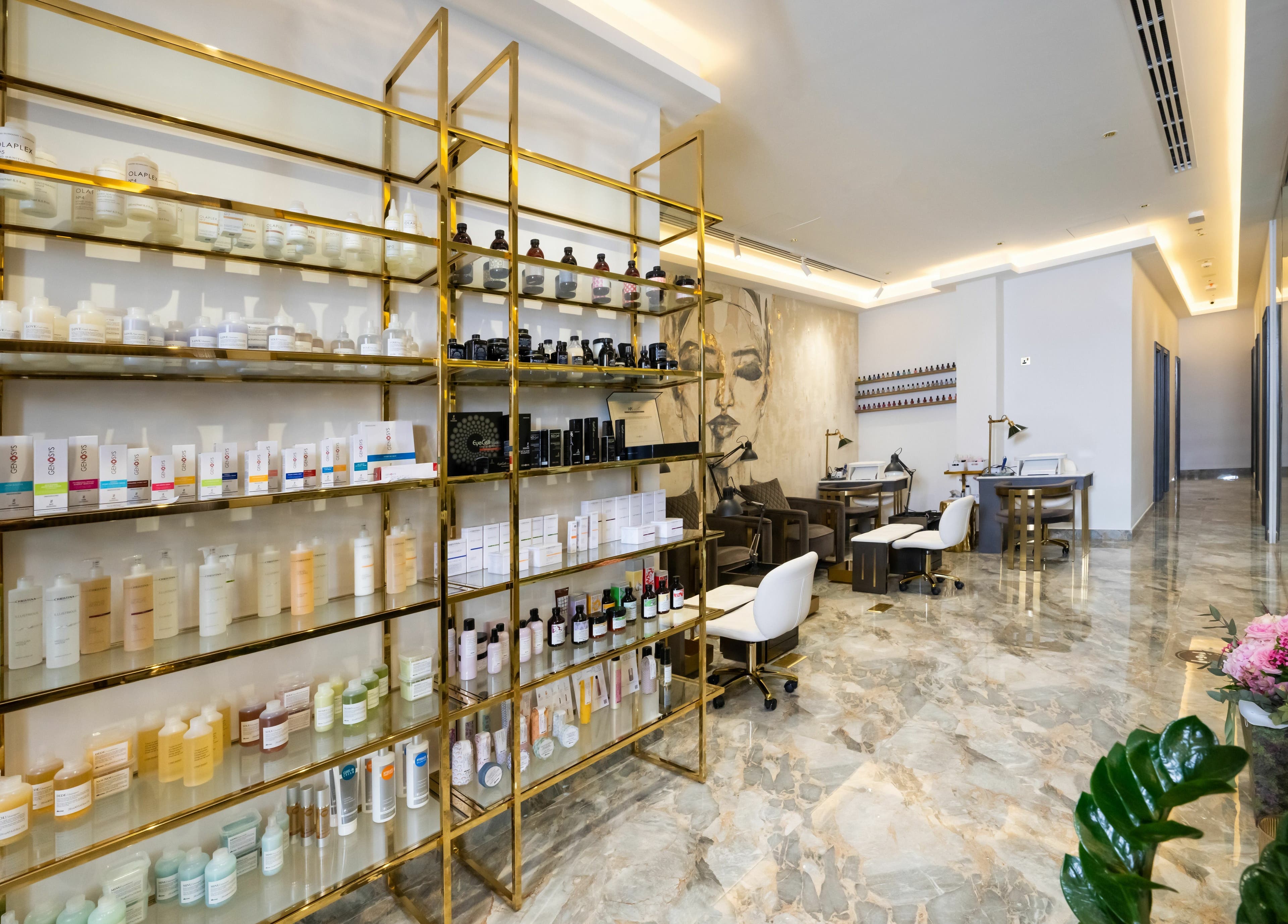 Modern interiors of The Beauty House by Takhmina Usmani in Dubai, AE, showcasing sleek shelving and serene space.