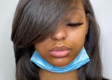 Sleek hair and long lashes by Hair by Rose in Pretoria, Gauteng, ZA, showcasing expert styling.