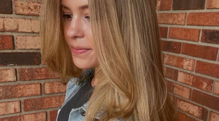Woman with styled blonde hair at The Salon and Spa at Randolph LLC, Randolph, New Jersey, US.