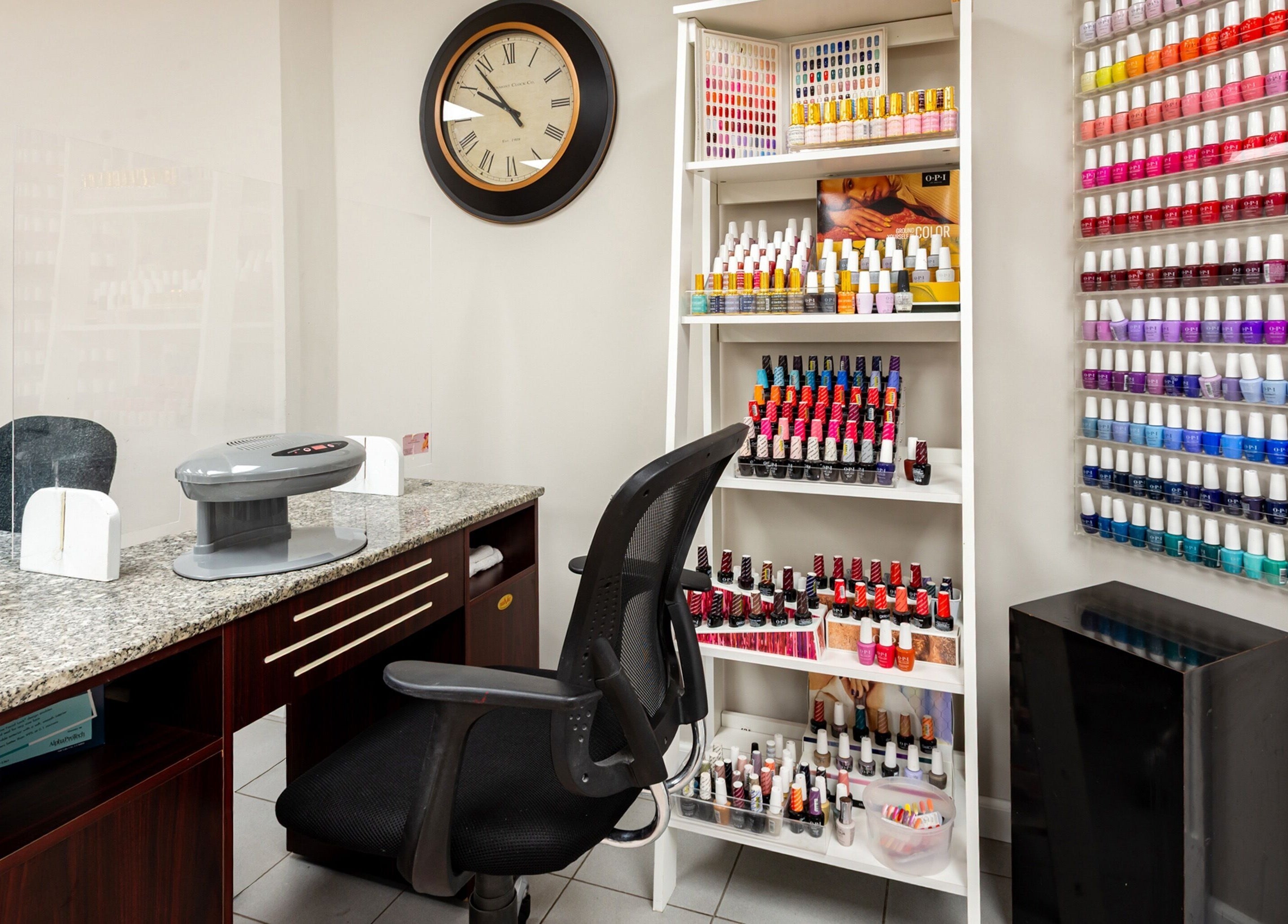 Nail polish selection at The Salon and Spa at Randolph LLC, Randolph, New Jersey, US, neatly organized on shelves.