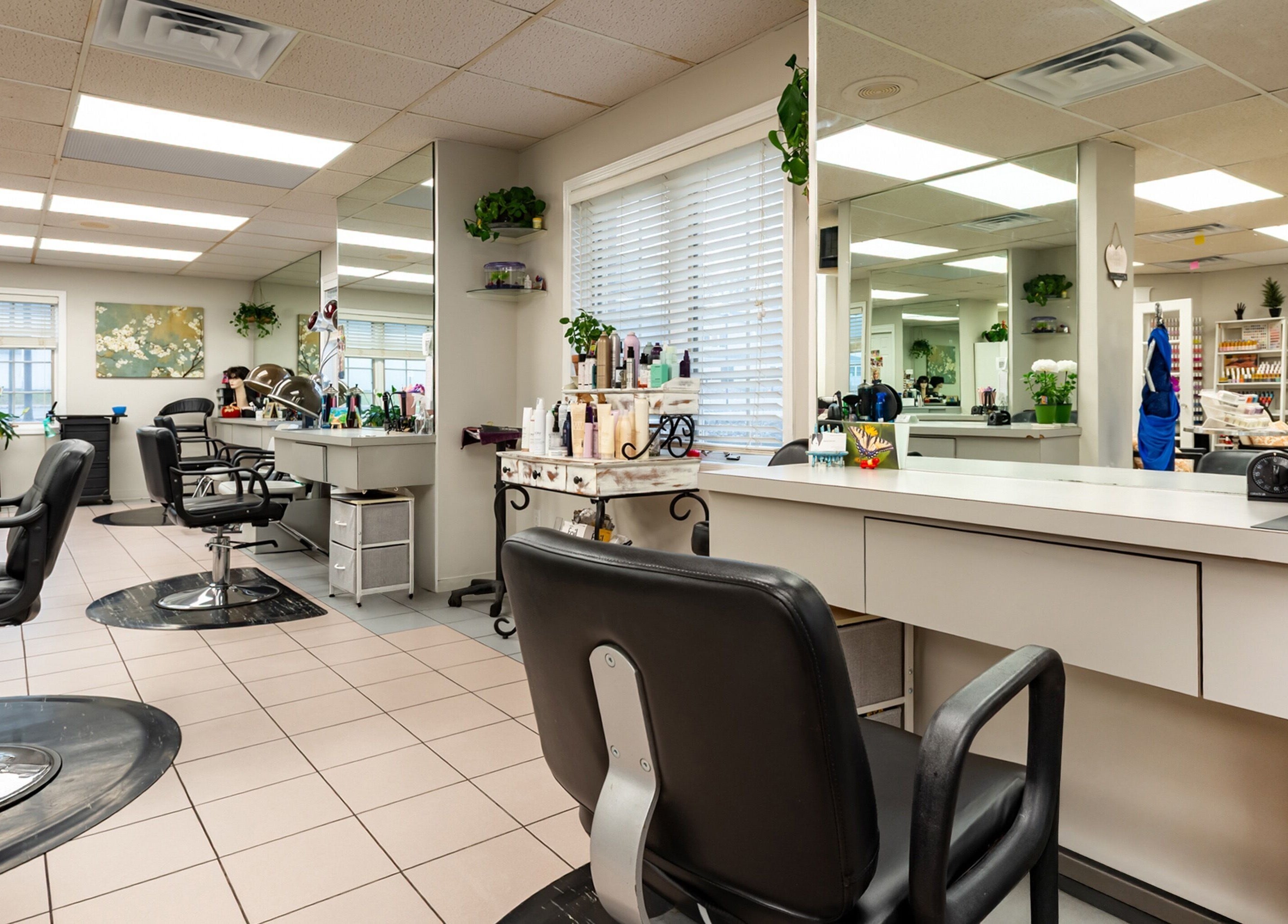 Interior of The Salon and Spa at Randolph LLC, stylish chairs and mirrors, Randolph, New Jersey, US.