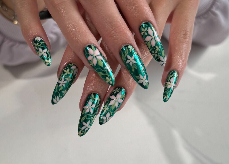 Intricate green floral nail art at Bicolor Los Feliz, Los Angeles, California, US.
