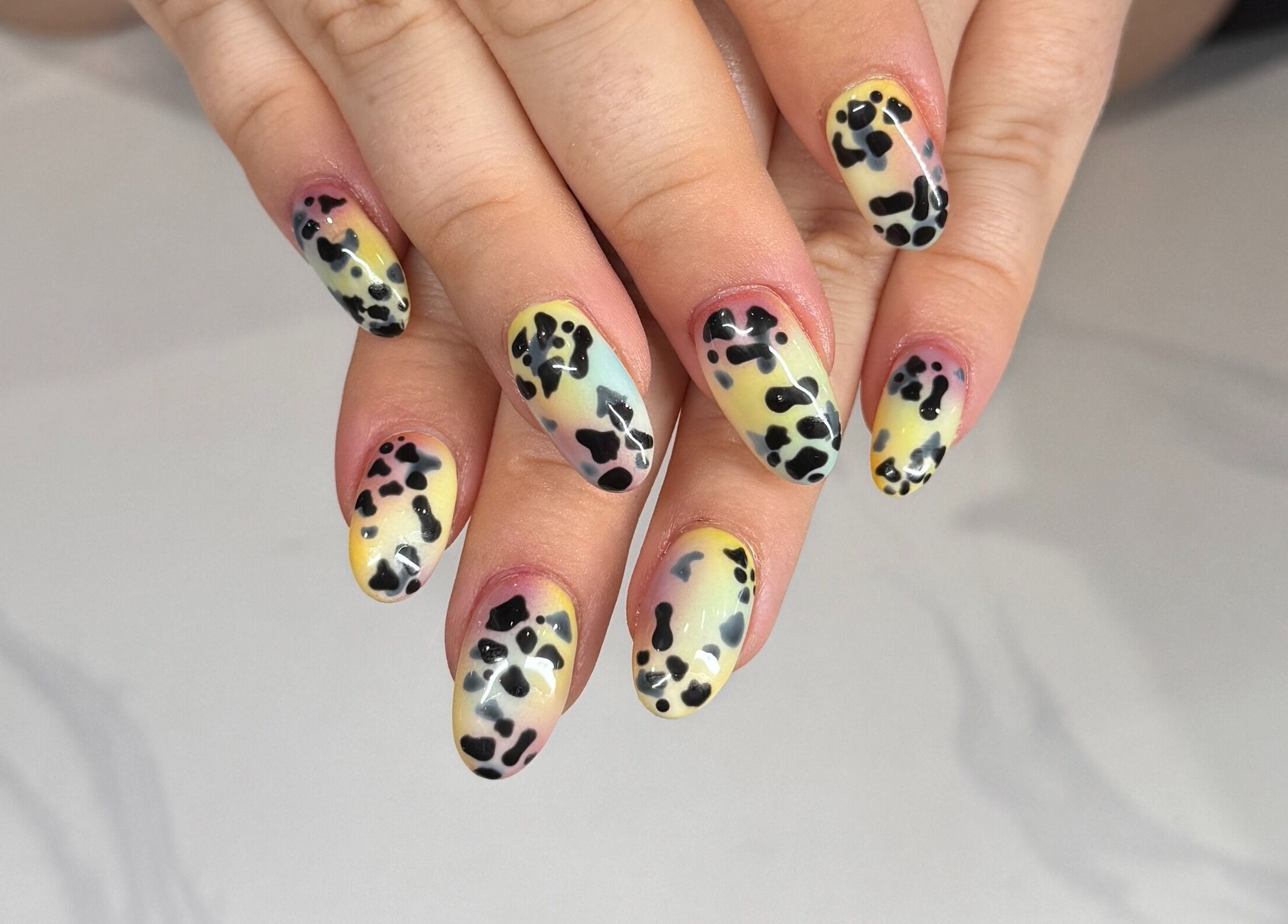 Stylish cheetah print nail art at Bicolor Los Feliz, Los Angeles, California, US.