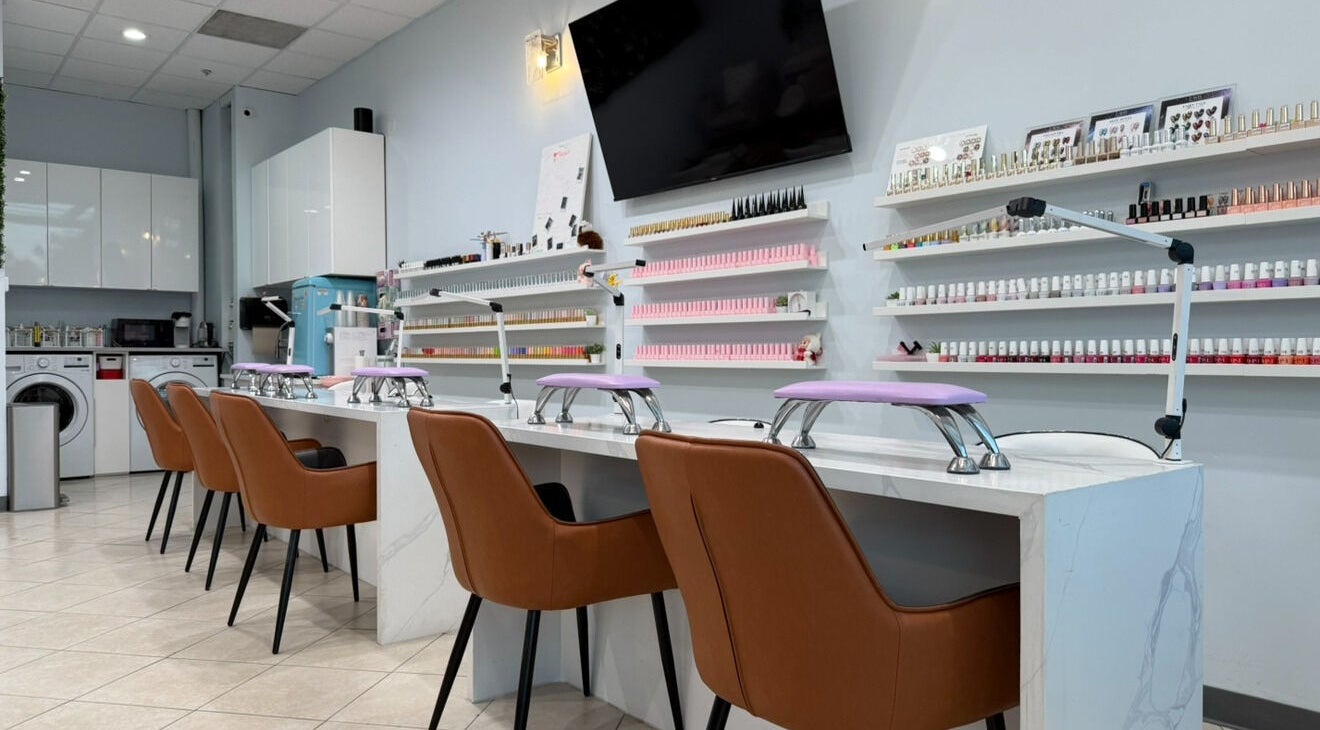 Modern nail salon in Bicolor Beverly Hills featuring sleek stations, Beverly Hills, California, US.