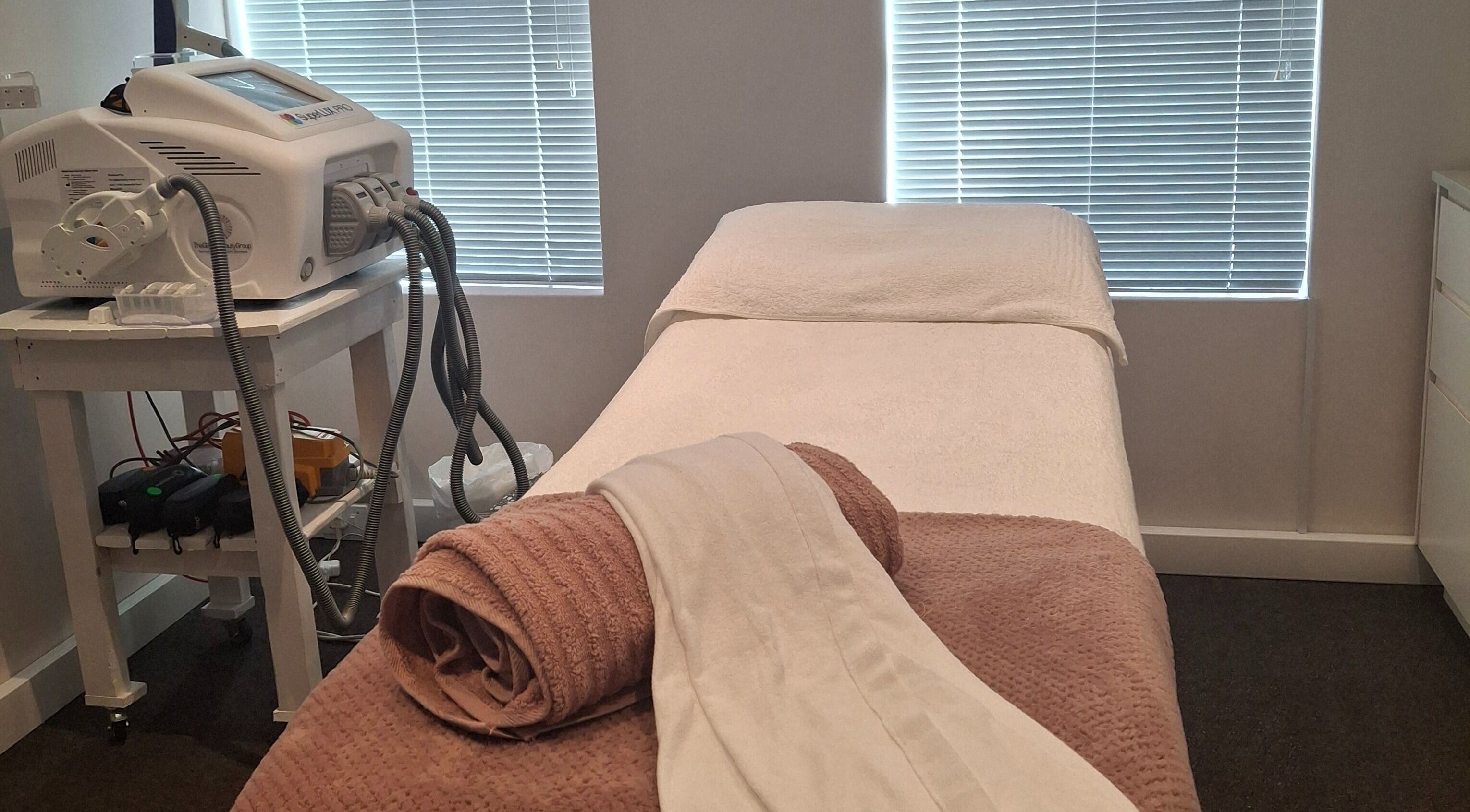 Treatment room at Go Bare Aesthetics and Skincare Clinic in Wellington, Western Cape, ZA featuring a modern setup.