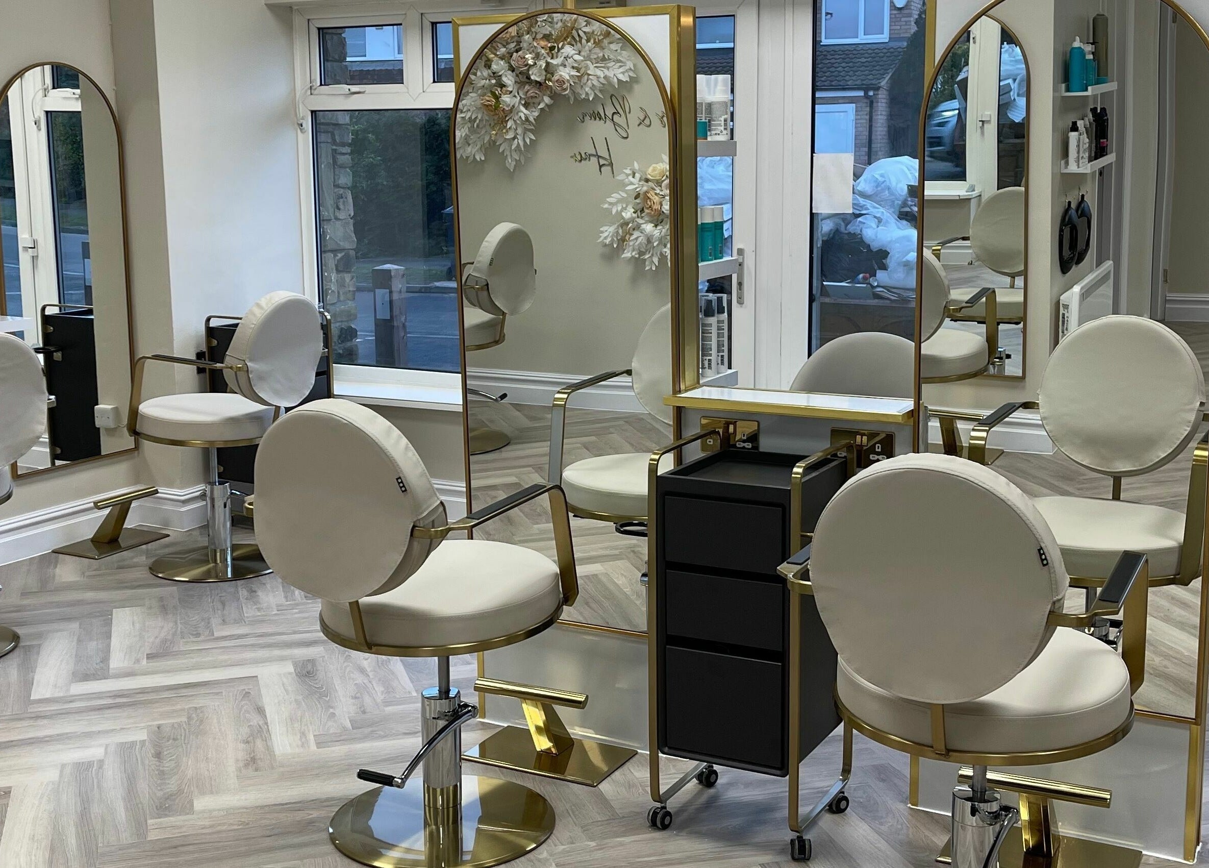 Elegant styling chairs and mirrors at Bliss & Bloom Hair, Nether Poppleton, England, GB.