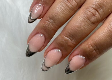Stylish nail art at Russian Goddess Beauty, Melbourne, Victoria, AU, featuring sleek black and nude tones.