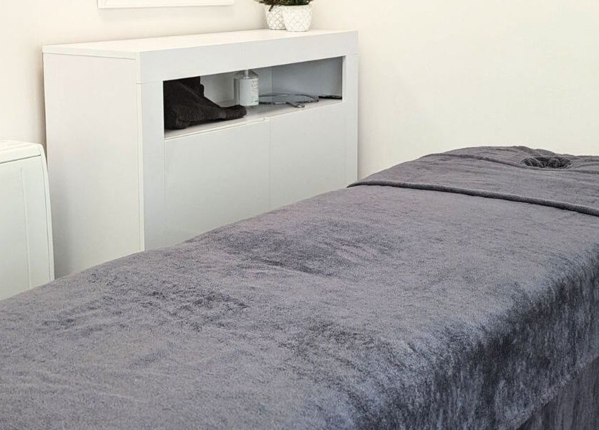 Massage bed in a tranquil setting at Innerspace Wellbeing, Leicester, England, GB.