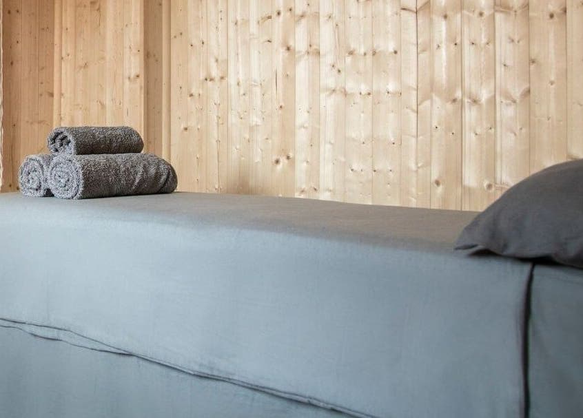 Relaxing massage table setup at Innerspace Wellbeing, Leicester, England, GB. Cozy and inviting atmosphere.