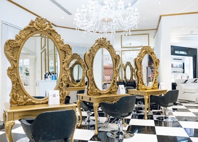 Luxurious interior of Locks by Loulou Al Wasl, Dubai, AE with ornate mirrors and plush seating.