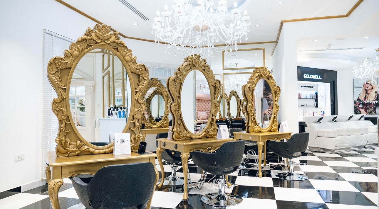 Luxurious interior of Locks by Loulou Al Wasl, Dubai, AE with ornate mirrors and plush seating.