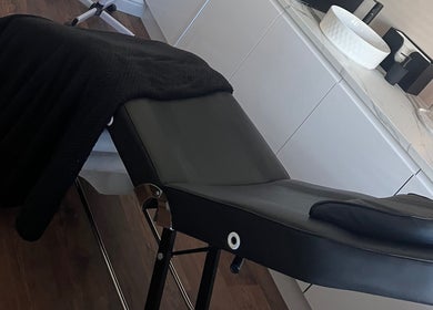 Luxurious treatment bed at Sam Jane The Salon in Lostock Hall, England, GB enhances relaxation and comfort.
