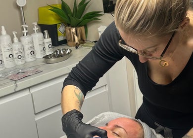 Professional skincare treatment at Sam Jane The Salon, Lostock Hall, England, GB. Aesthetician working on client.