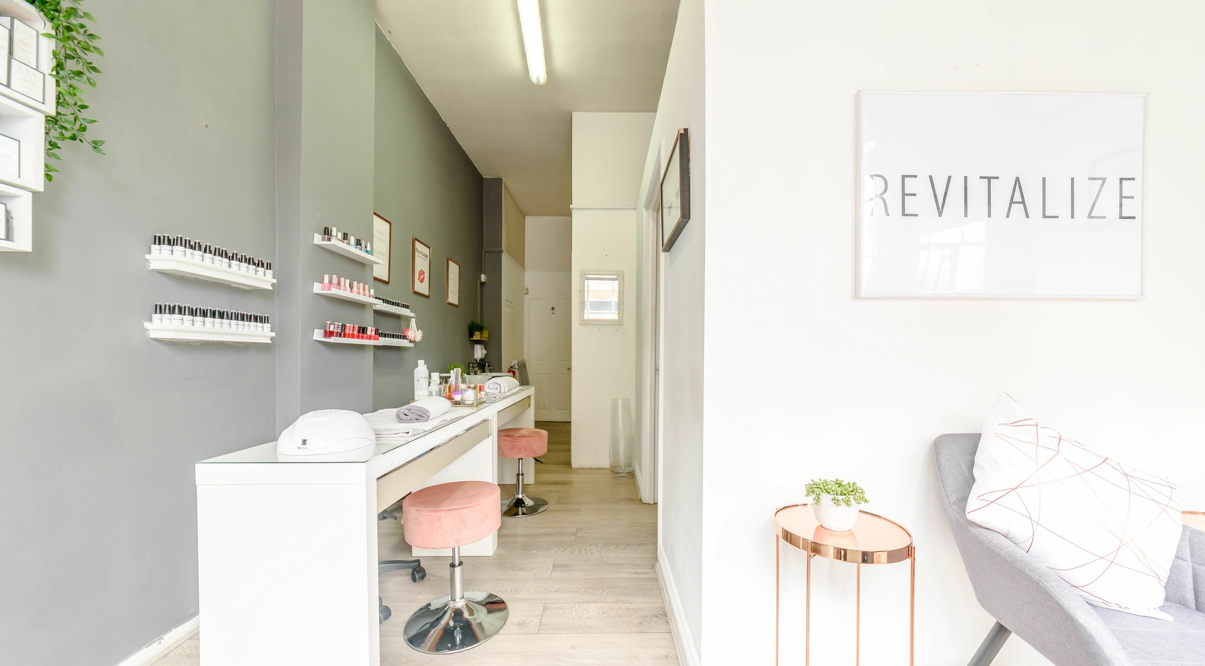 Revitalize Beauty Salon's chic interior with modern decor in London, England, GB. Perfect for relaxation.