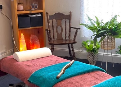 Peaceful massage room at Macks Massage, Albany, Western Australia, AU, featuring a cozy table and calming decor.