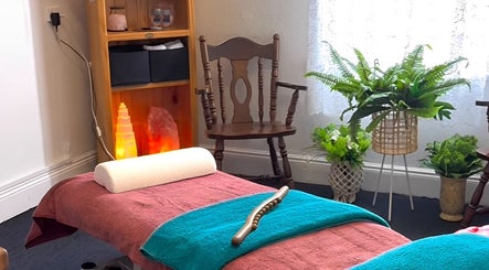 Peaceful massage room at Macks Massage, Albany, Western Australia, AU, featuring a cozy table and calming decor.