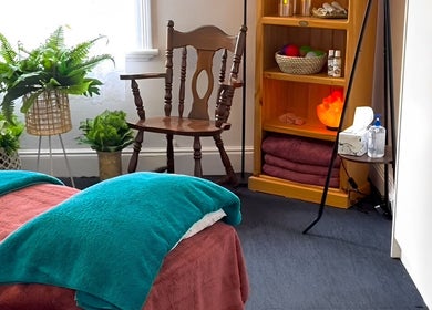 Relaxing therapy room at Macks Massage, Albany, Western Australia, AU with cozy decor and calming ambiance.