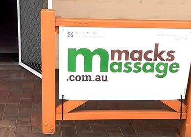 Entrance sign of Macks Massage in Albany, Western Australia, AU, welcoming visitors.