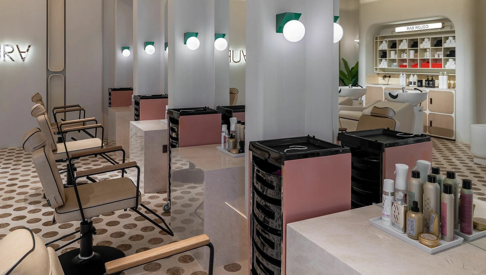 Modern salon interior at AURA - Riyadh, featuring elegant styling stations in Riyadh, Riyadh Province, SA.