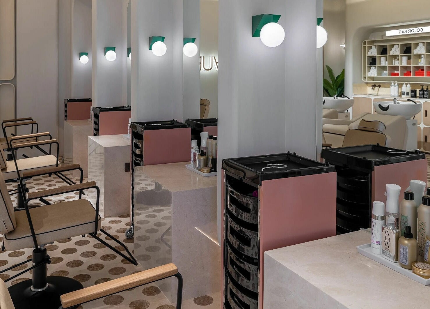 Modern salon interior at AURA - Riyadh, featuring elegant styling stations in Riyadh, Riyadh Province, SA.