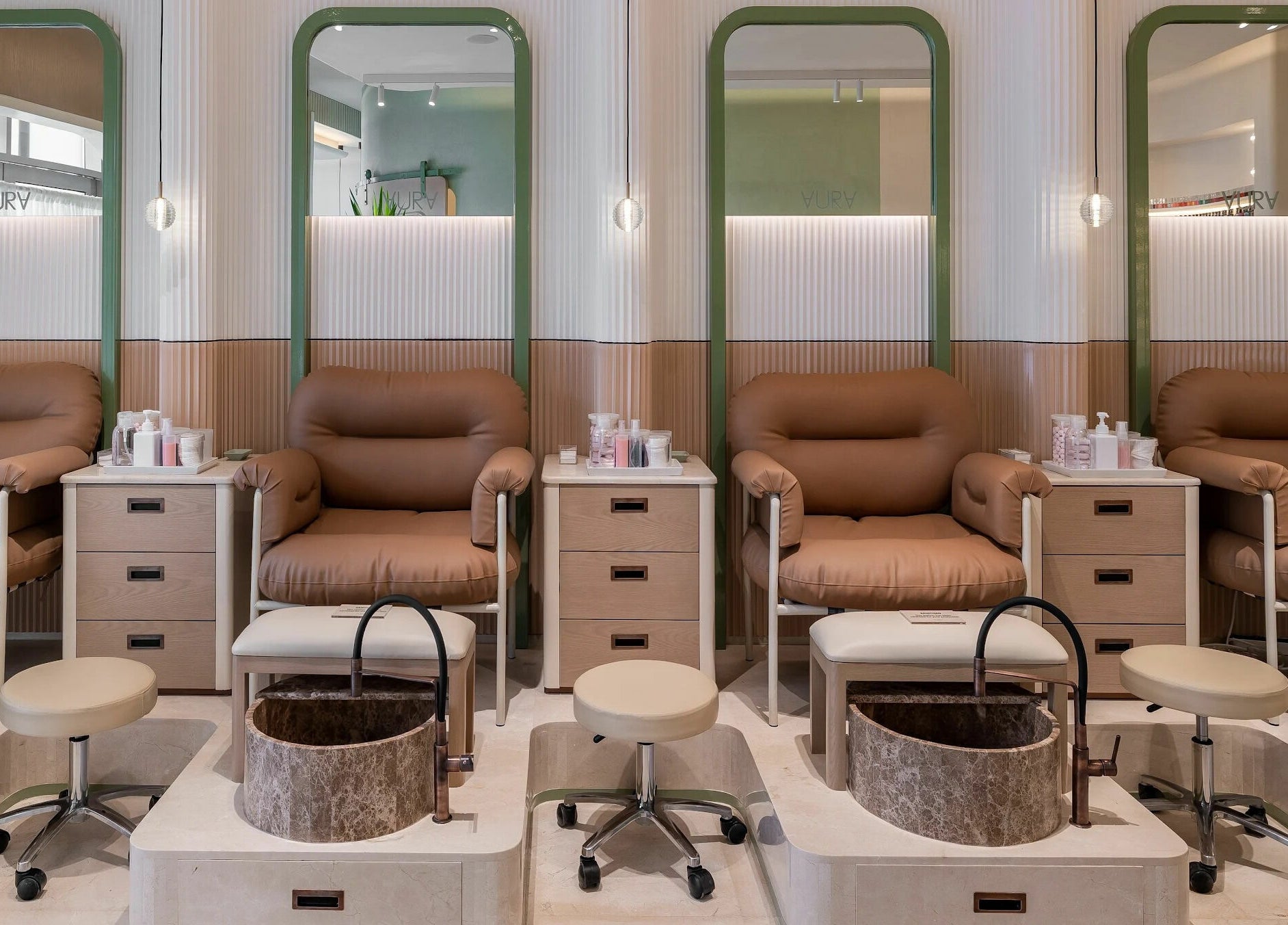Comfortable pedicure chairs at AURA - Riyadh, Riyadh, Riyadh Province, SA, showcasing a calm ambiance.