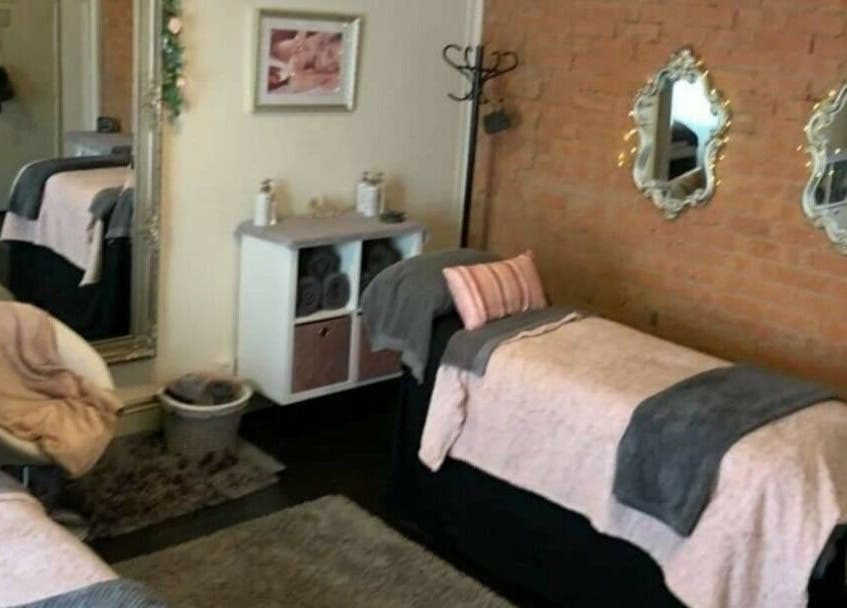 Cozy treatment room at Venus Beauty, Derby, England, GB with stylish decor and soft ambiance.