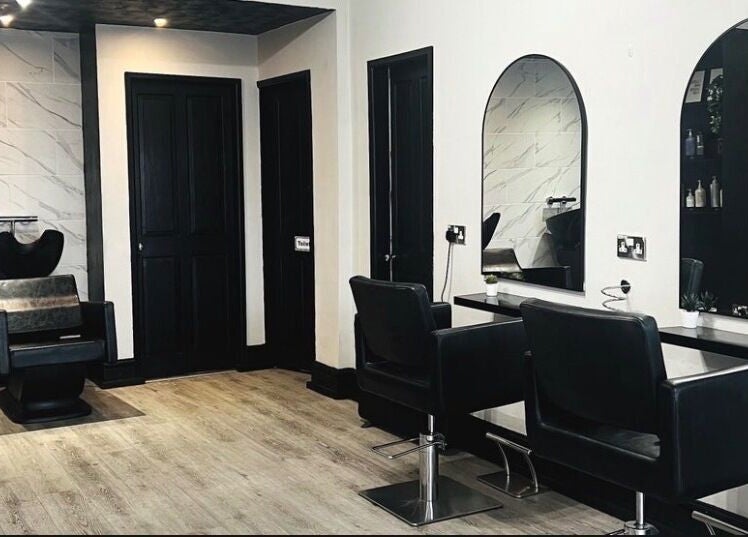 Chic salon interior at Kerry Wright Aesthetics at Lostock Hall, featuring stylish chairs in Lostock Hall, England, GB.