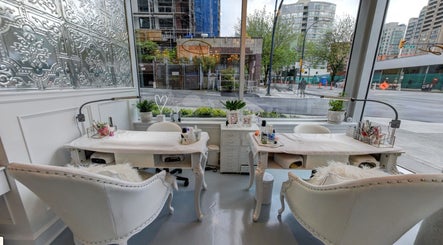 Elegant nail stations at Prép Beauty Parlour, Vancouver, British Columbia, CA with street view backdrop.