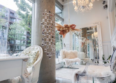 Elegant interior of Prép Beauty Parlour in Vancouver, British Columbia, CA, featuring chic chairs and plush decor.