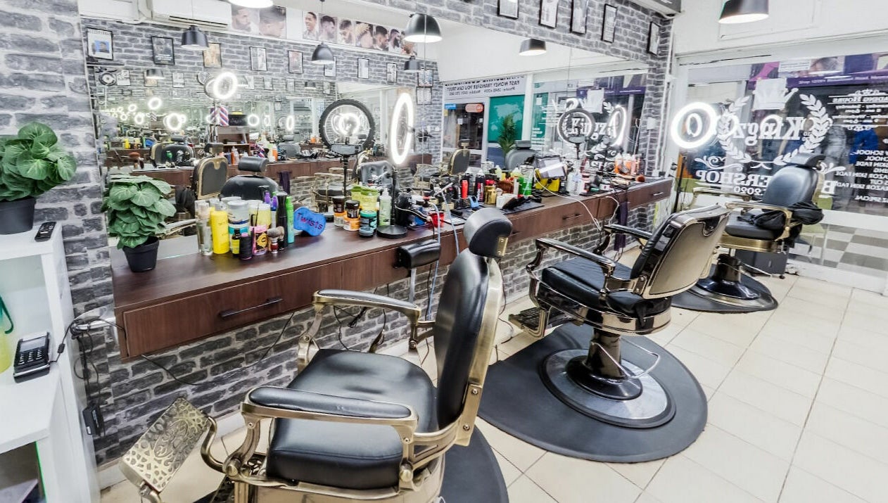 Kingz Barbershop's sleek interior with barber chairs and mirrors in Moorooka, Queensland, AU. 