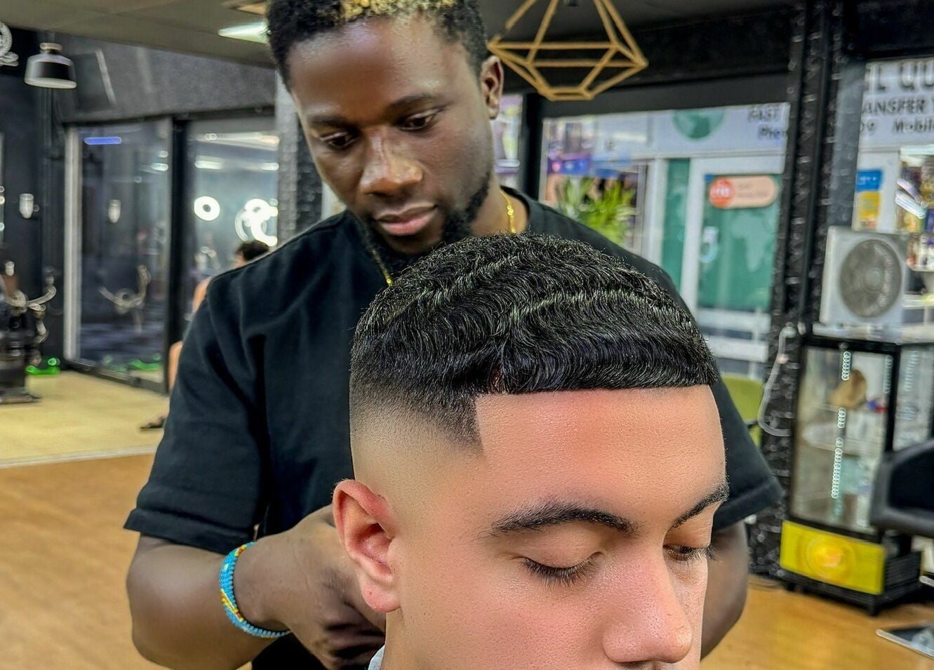 Expert barber styling at Kingz Barbershop, Moorooka, Queensland, AU. Modern space enhancing the grooming experience.