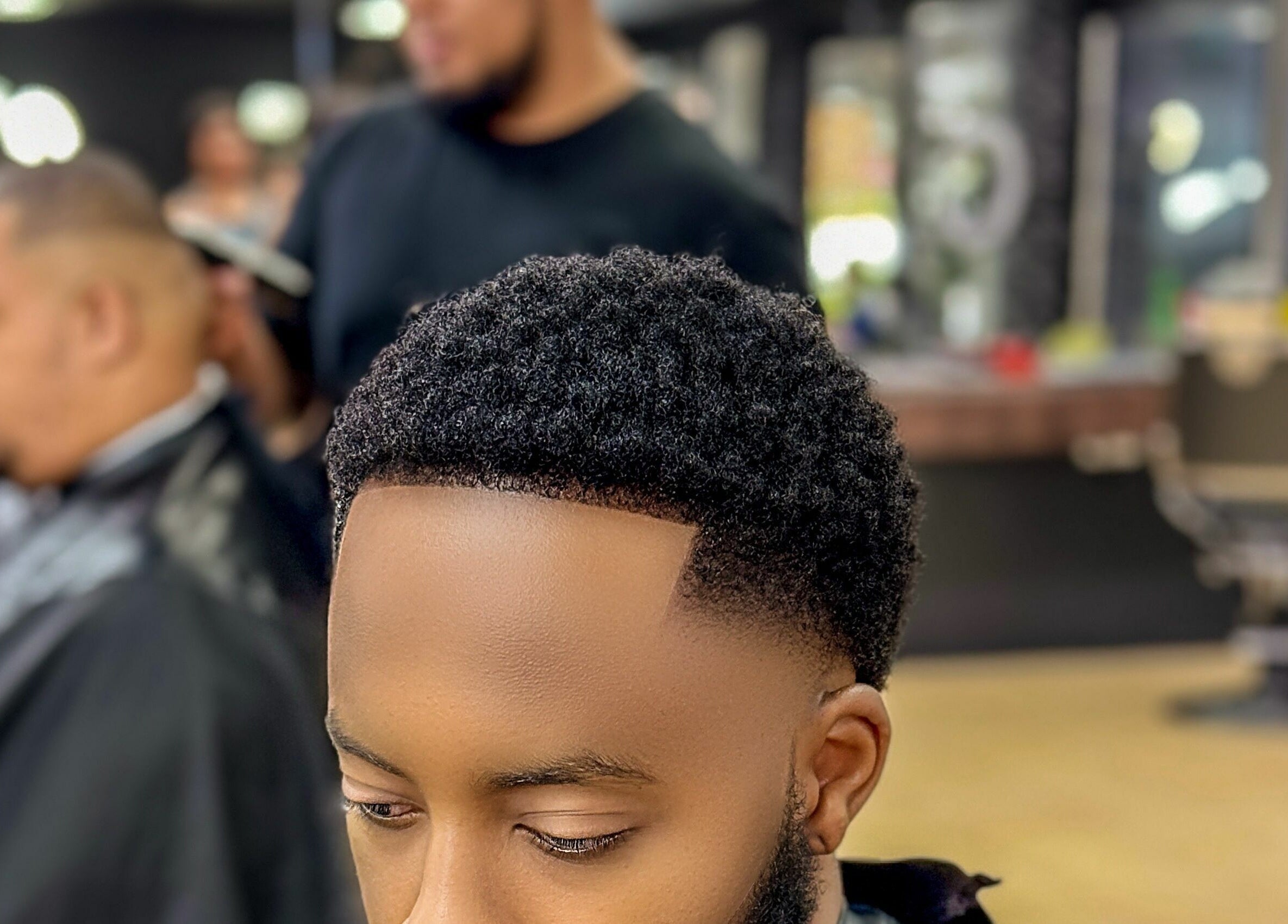 Expert fade haircut at Kingz Barbershop, Moorooka, Queensland, AU. Modern styling with precise lines.