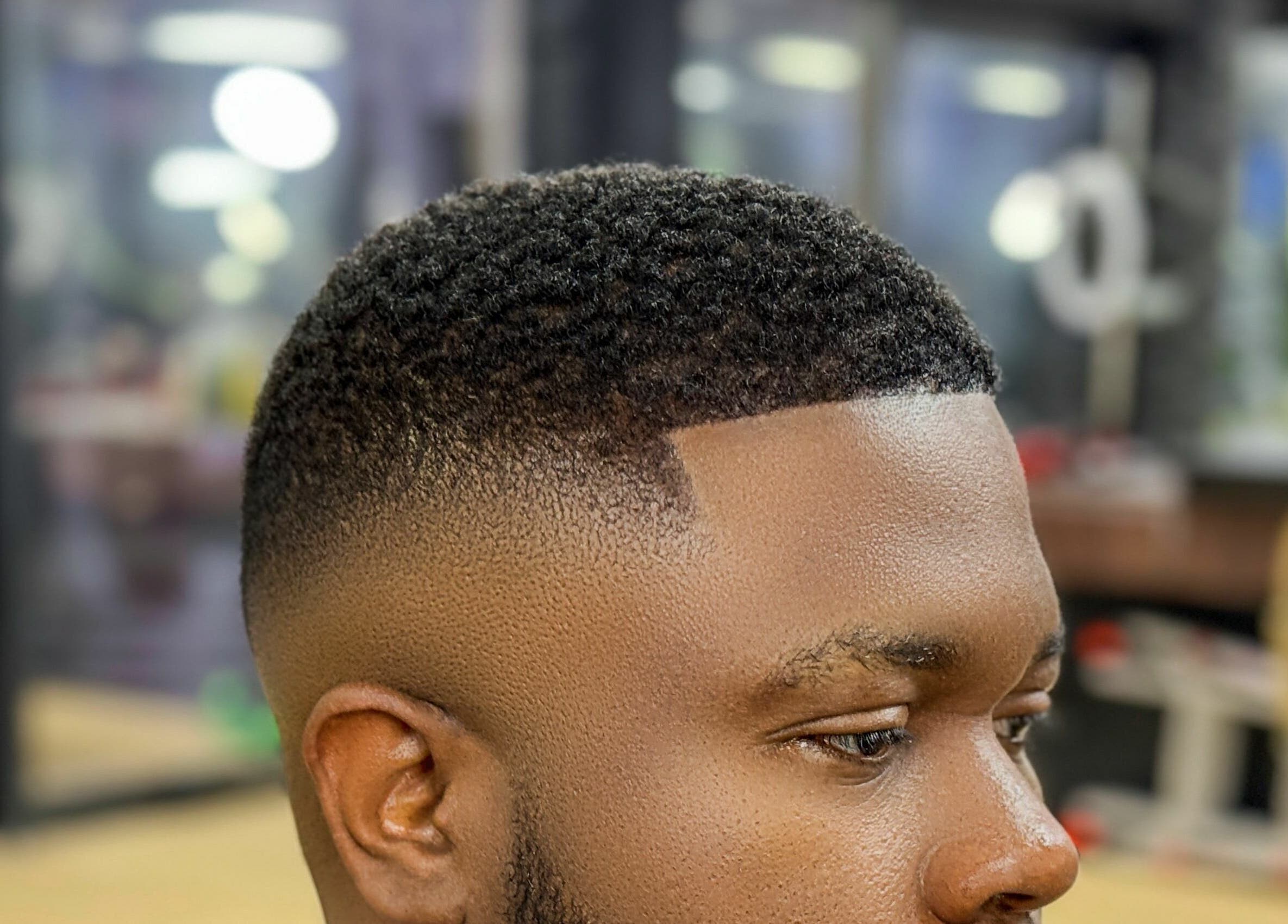 Close-up of sleek fade haircut at Kingz Barbershop, Moorooka, Queensland, AU. Modern styling.