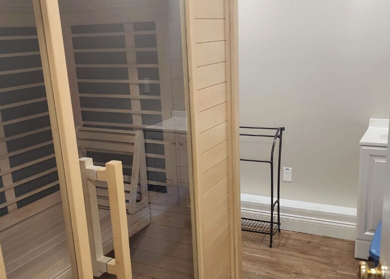 Tranquil sauna room at Braven at Relaxations in Alma, Michigan, US, inviting relaxation and rejuvenation.