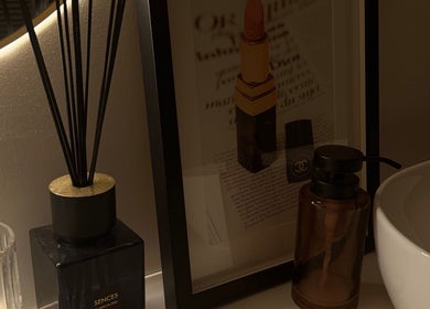 Elegant vanity setup at Amber Henman Makeup Artist in Banff, Scotland, GB with decor and beauty items.