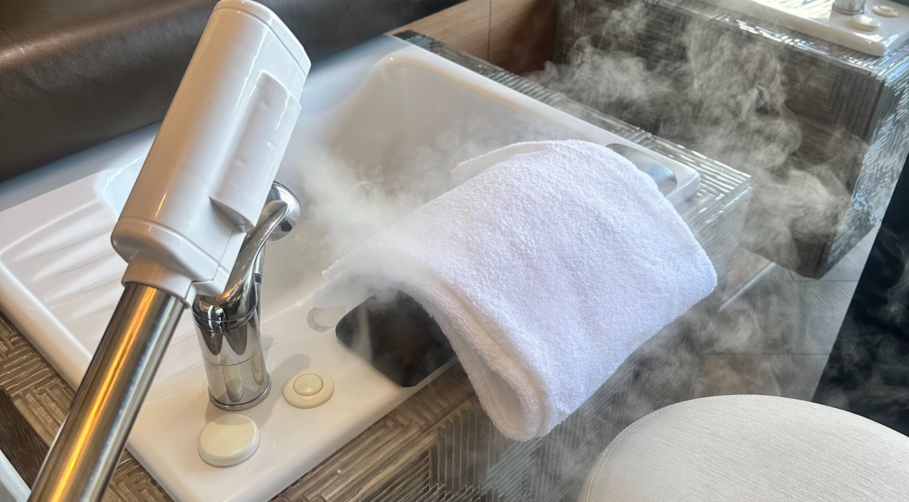 Steam rising from a pedicure station at Footnanny Nail Spa - Four Season Hotel | Los Angeles, California, US.