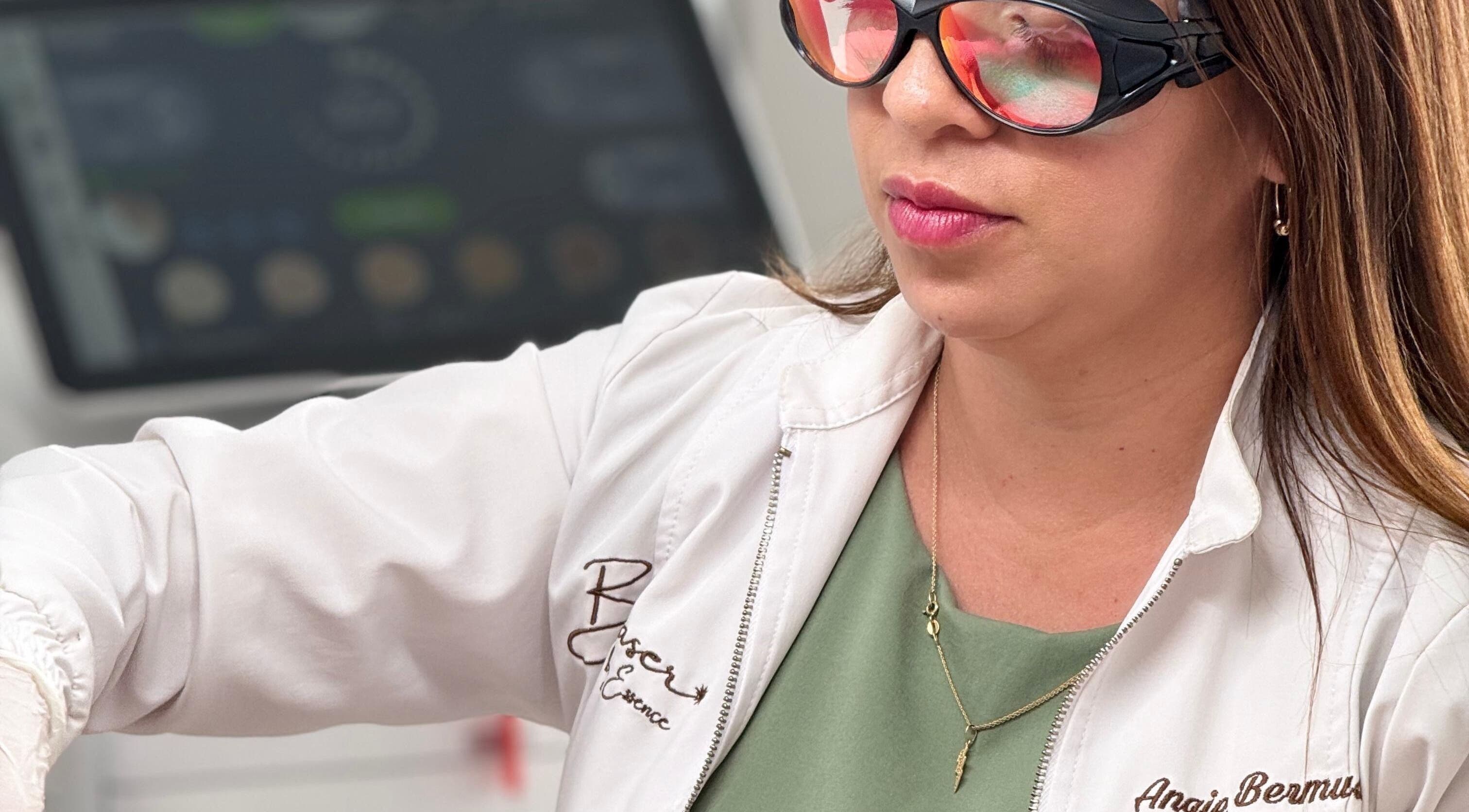 Laser treatment at Bonlaser by Essence, Kralendijk, Bonaire with expert wearing protective goggles.