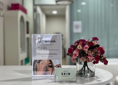 Welcome desk at Facial Skin Specialist in Smithfield 2164, New South Wales, AU, showcasing floral decor and an offer sign.