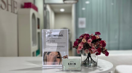 Welcome desk at Facial Skin Specialist in Smithfield 2164, New South Wales, AU, showcasing floral decor and an offer sign.