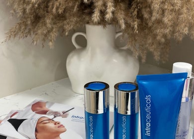 Skincare products at Facial Skin Specialist, Smithfield 2164, New South Wales, AU displayed with a white vase backdrop.