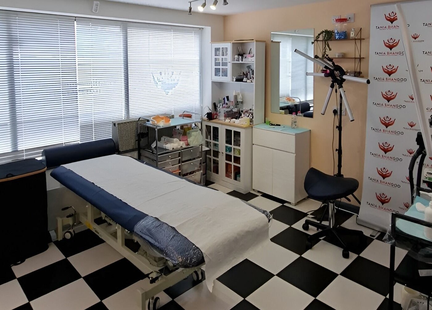 Cozy beauty treatment room interior at Tania Bhangoo Permanent Makeup, Cambridge, England, GB.