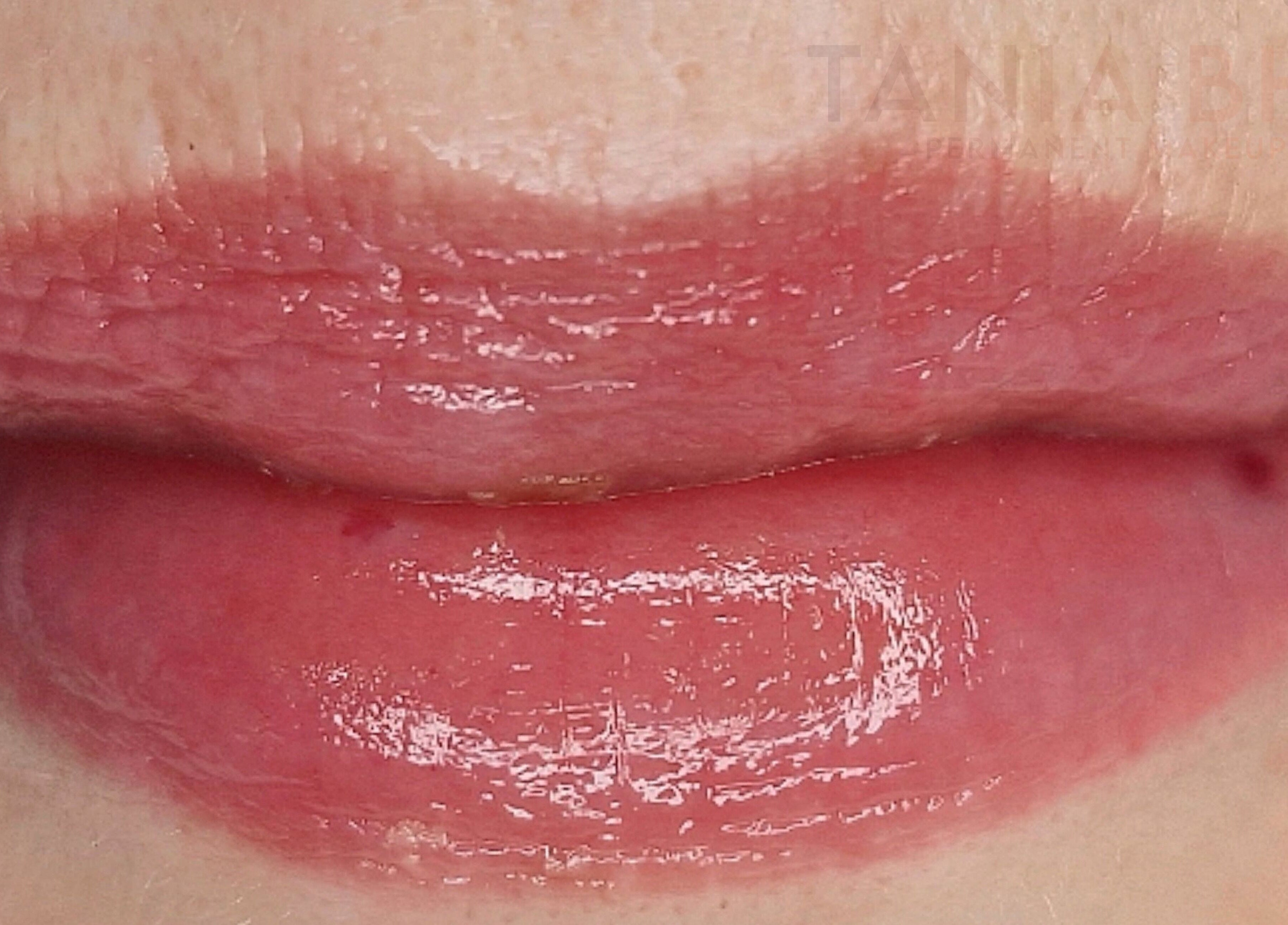 Glossy lip enhancement at Tania Bhangoo Permanent Makeup, Cambridge, England, GB.