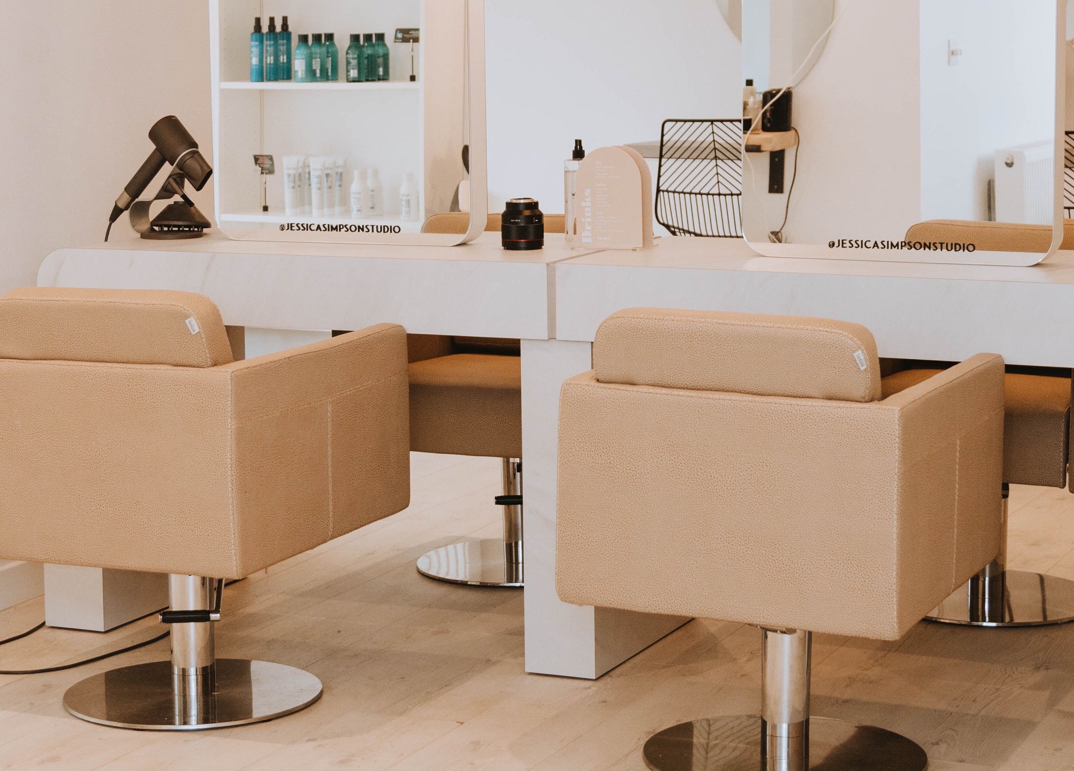 Modern salon chairs at Jessica Simpson Studio, Tonbridge, England, GB, offering premium beauty services.