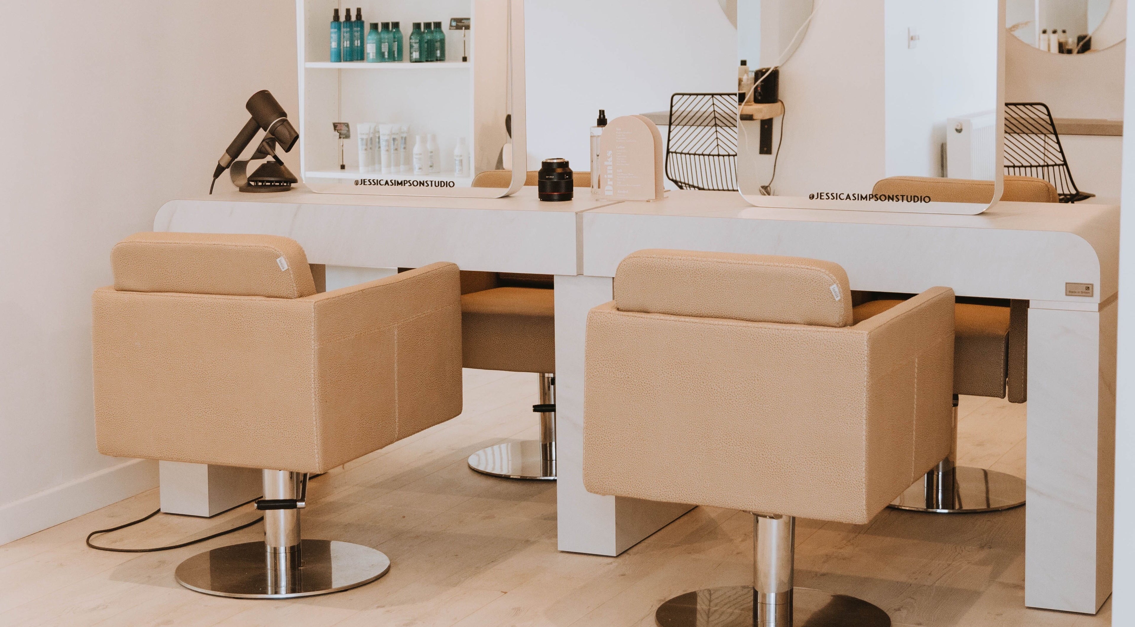 Modern salon chairs at Jessica Simpson Studio, Tonbridge, England, GB, offering premium beauty services.