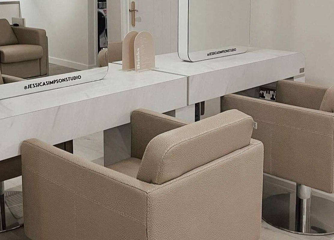 Modern salon chairs and mirrors at Jessica Simpson Studio, Tonbridge, England, GB.